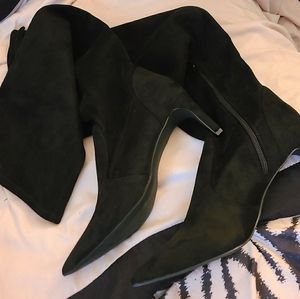 Knee high pointed toed boots